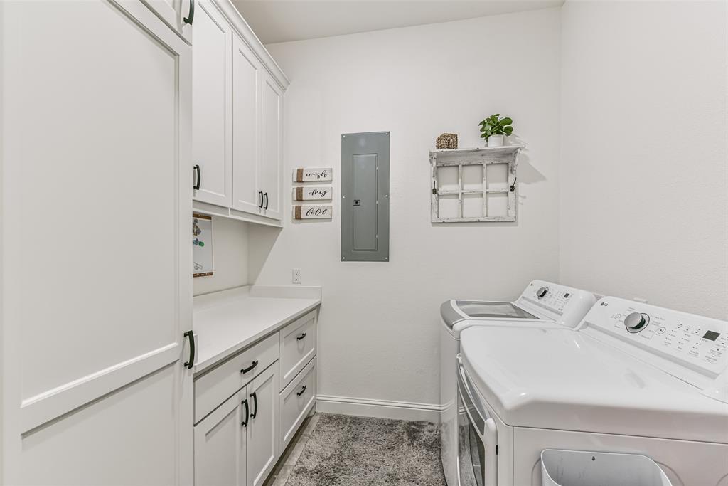 Custom built-ins in the laundry room for more storage.