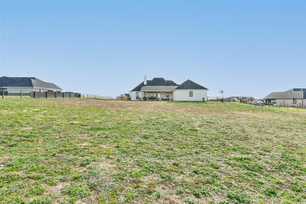 Sitting on 1.23 acres, you will have plenty of room to run!