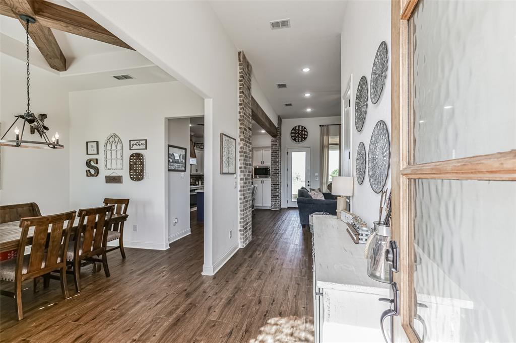 Lots of natural light enters throug the front of the home.