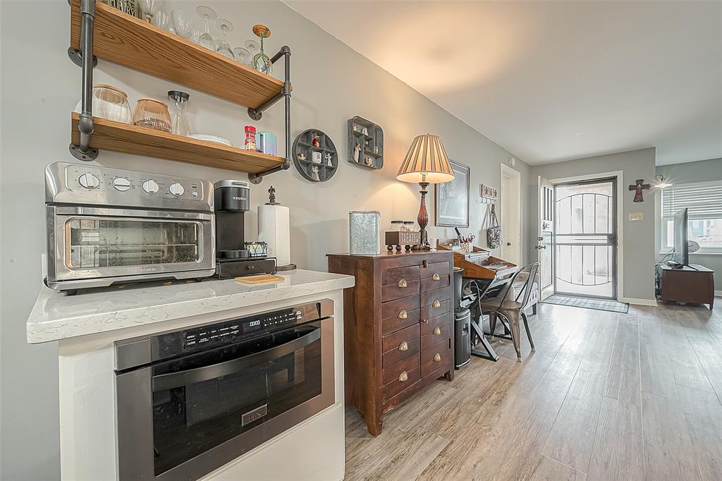 The kitchen in this unit offers a welcoming view that seamlessly connects to the rest of the living space, creating a harmonious and open layout.