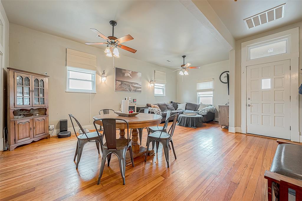 This inviting space is perfect for gatherings, intimate dinners, or entertaining friends. The open-concept design seamlessly connects the dining area to the living area.