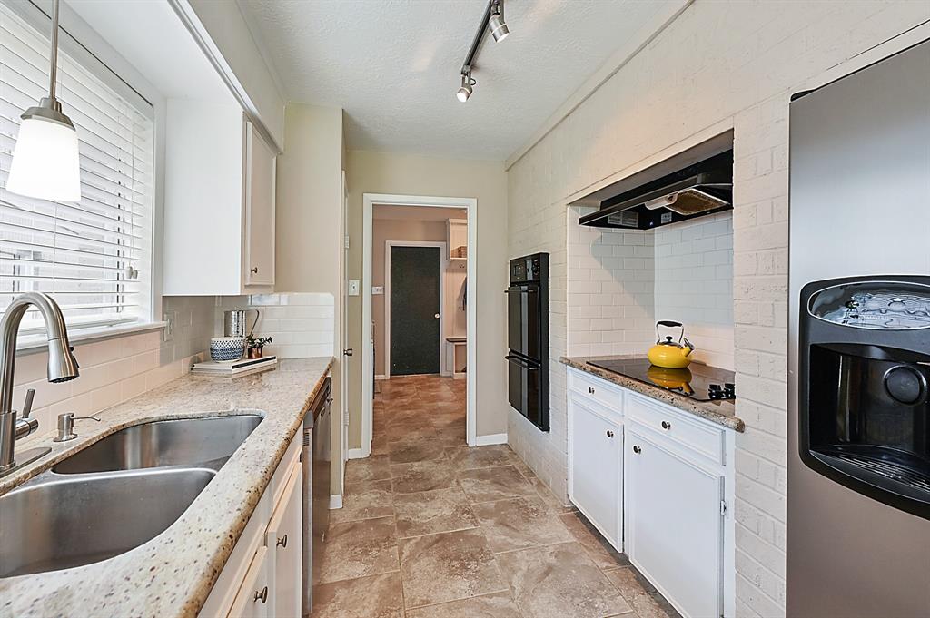 Updated kitchen is flooded with natural light