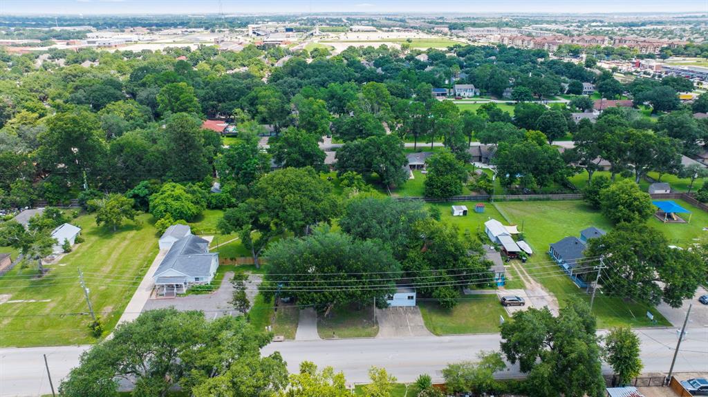 Another aerial view of lot with views of development to the north. Katy ISD stadiums and Miller Career Center are located north of property.