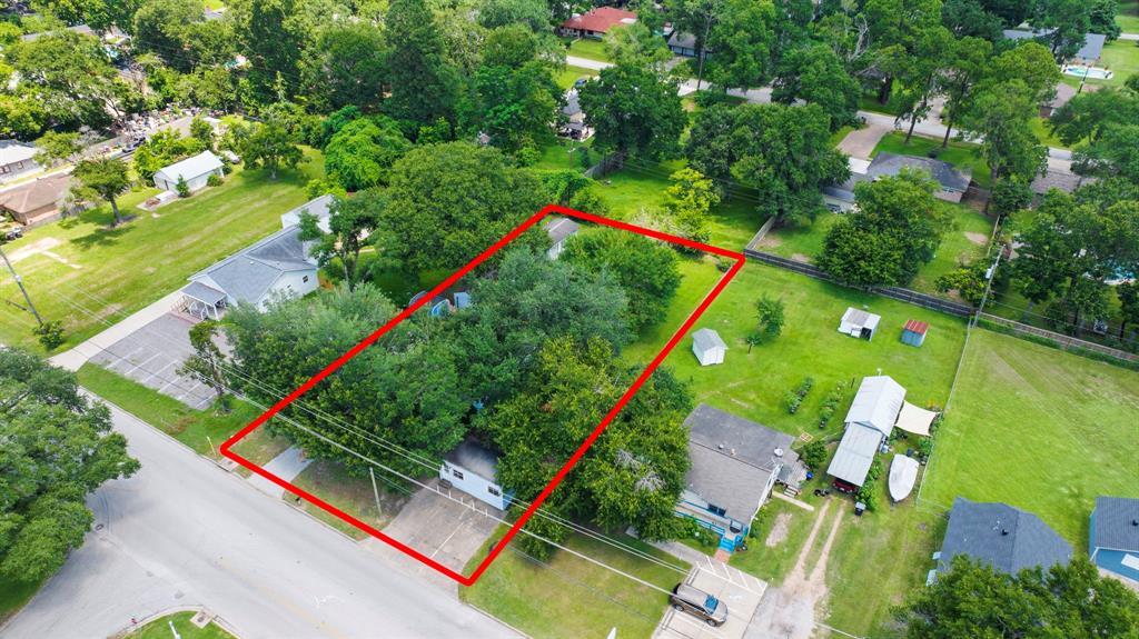 Aerial view showing outline of lot on 5034 East 5th St. which is zoned C-1. Lot is 20,288 square feet in size with 100\' of frontage on East 5th and is 204\' deep.