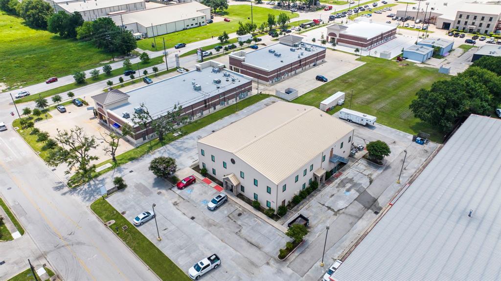 Businesses located just east of property off East 5th Street and intersection with Katy Ft. Bend Rd.