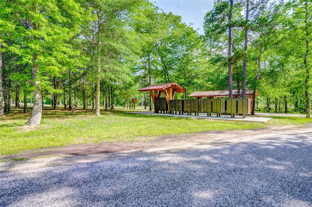 Covered mailboxes for Texas Grand Ranch are located in a cluster group.