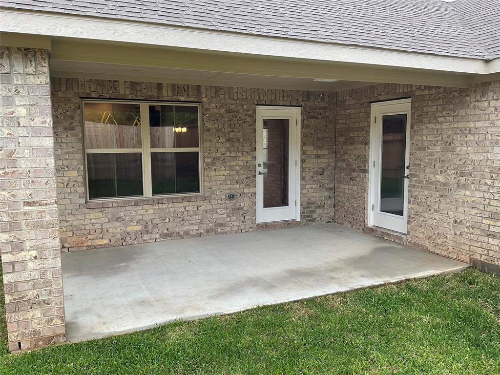 Covered and partially enclosed back porch