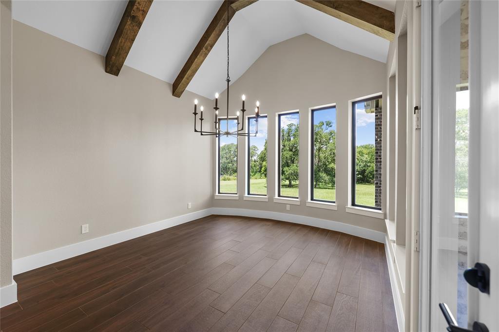 This space will be where dinners are enjoyed, amazing conversations will take place, and memories are made. Stunning beam ceilings make this formal dining even grander.