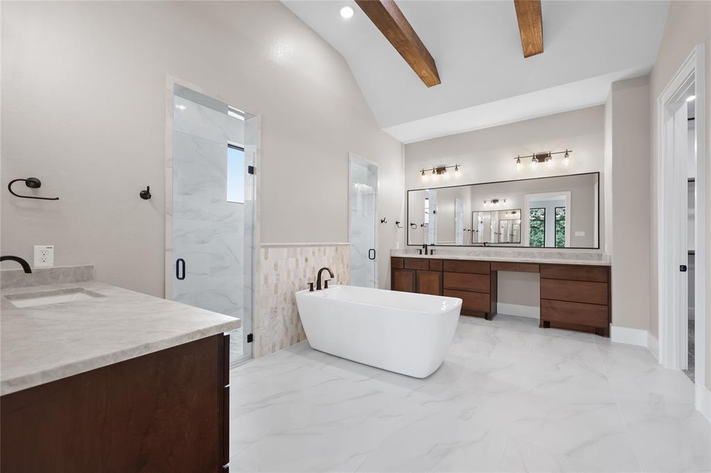 Updated picture as of May 25th: Floors are installed in your primary spa retreat. Marble wall tiles and railing installed above what will be your soaking tub. Water closet is to the right. Two openings on the left is the walk-through shower.