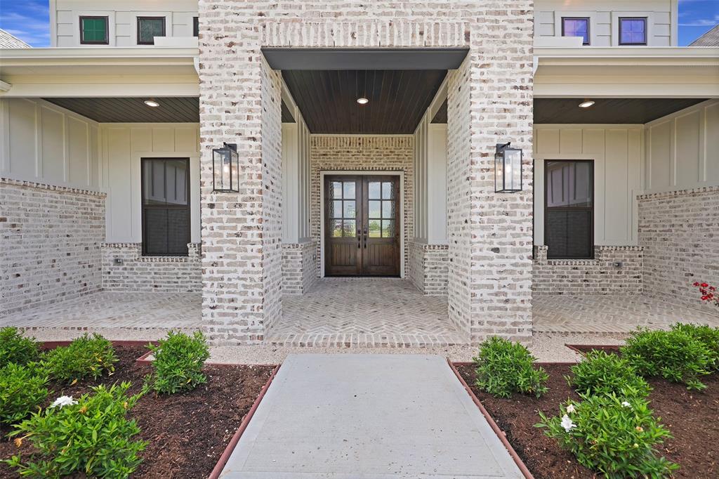 The 3 car garage is on the right side of the home. Expansive driveway space for multiple cars and trucks when friends and family visit.