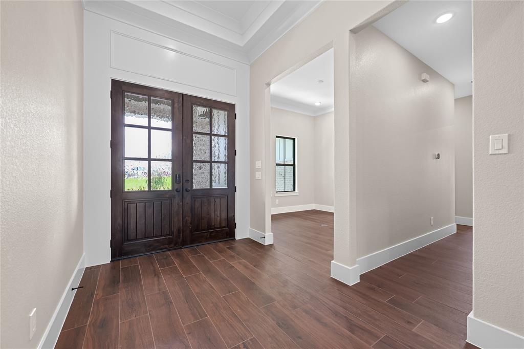 Updated picture as of May 25th: Tiled floors resembling hardwoods are installed.