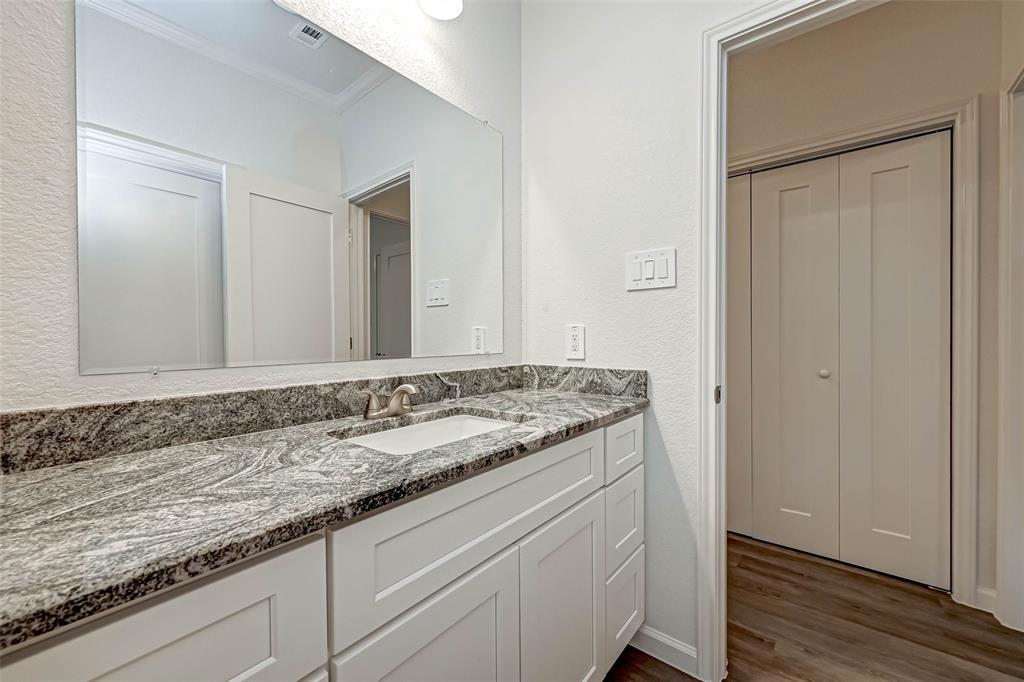 Primary Bathroom, the Utility Room is behind the hall doors