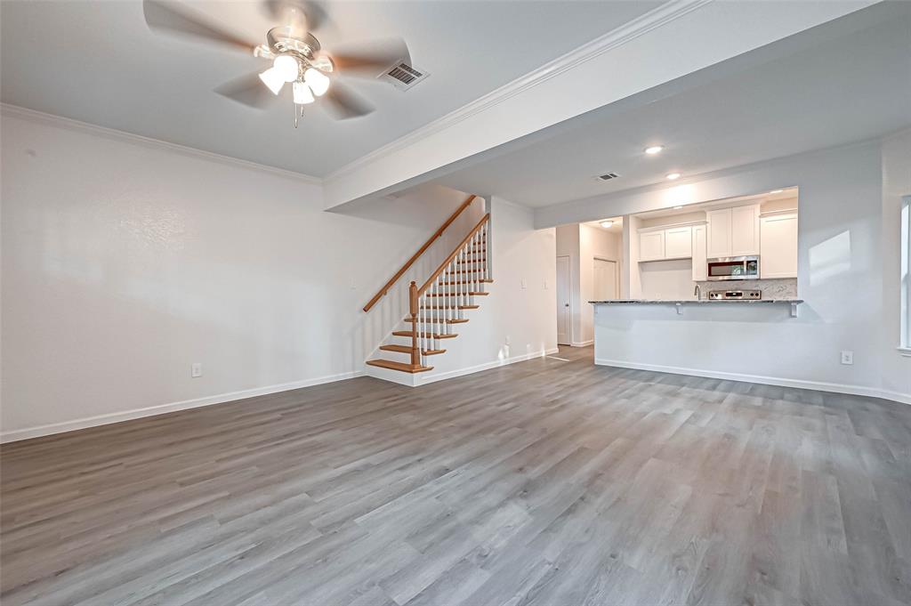 Vinyl plank flooring throughout. No carpet downstairs.