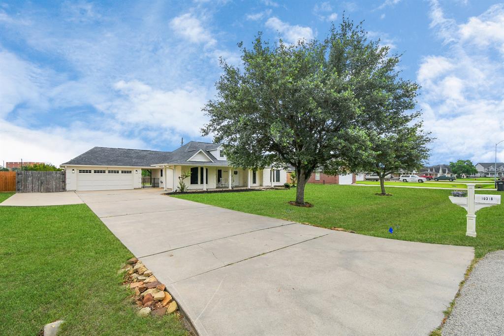 Mature tree in yard provides shade and curb appeal.