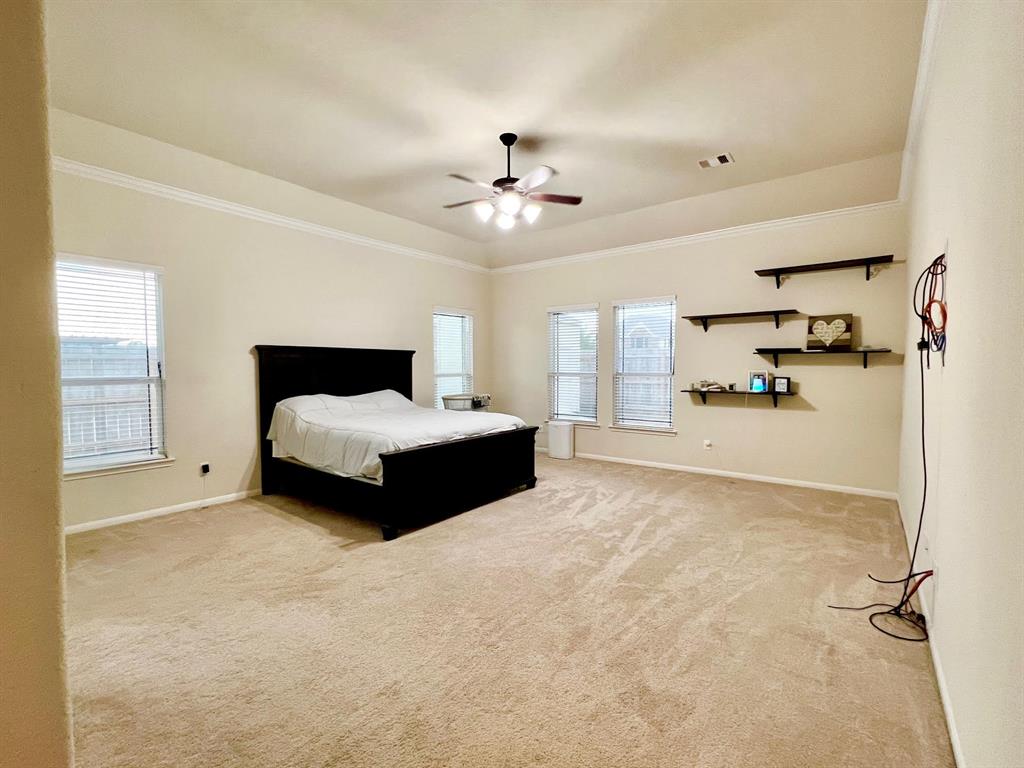 The primary bath with separate sinks, vanity area, soaking tub and shower.