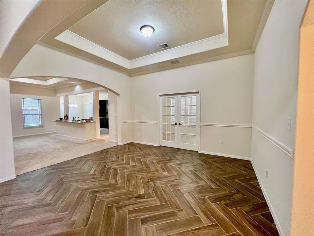 The flooring carries over to the dining room.