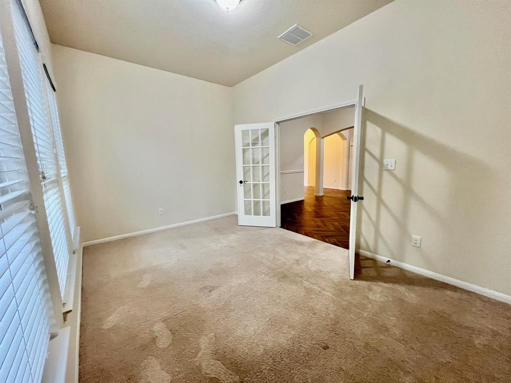 The large living area that is open to the kitchen.