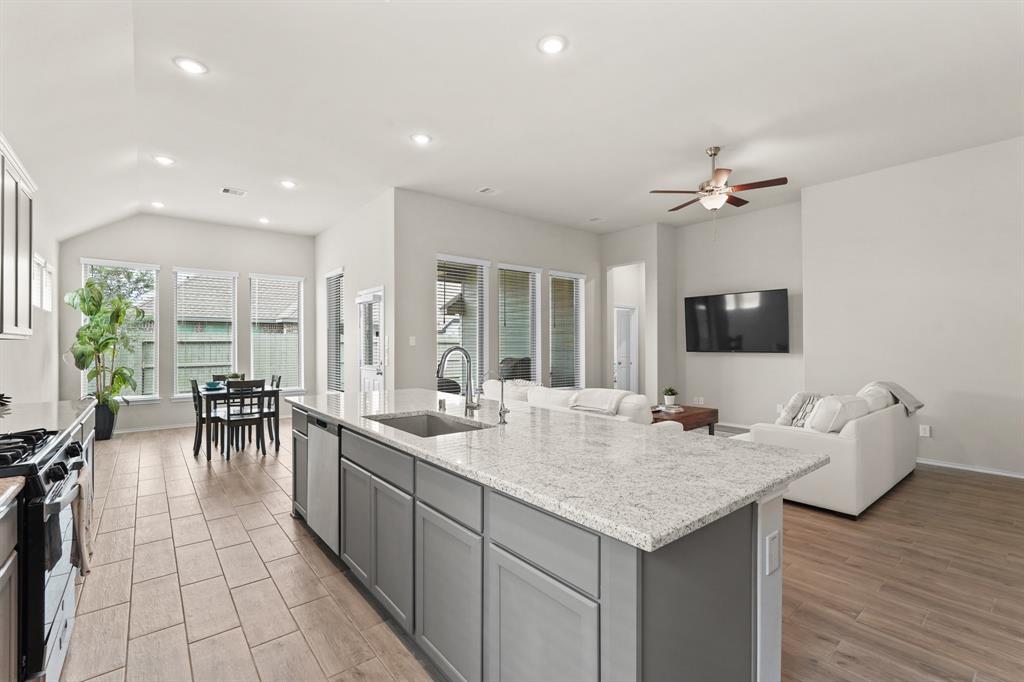 Great view from the kitchen, to the breakfast area, to the living room -  everything flows seamlessly