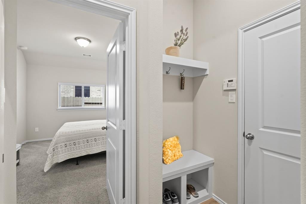 Convenient mudroom from the garage to store jackets and shoes to keep your home nice and tidy