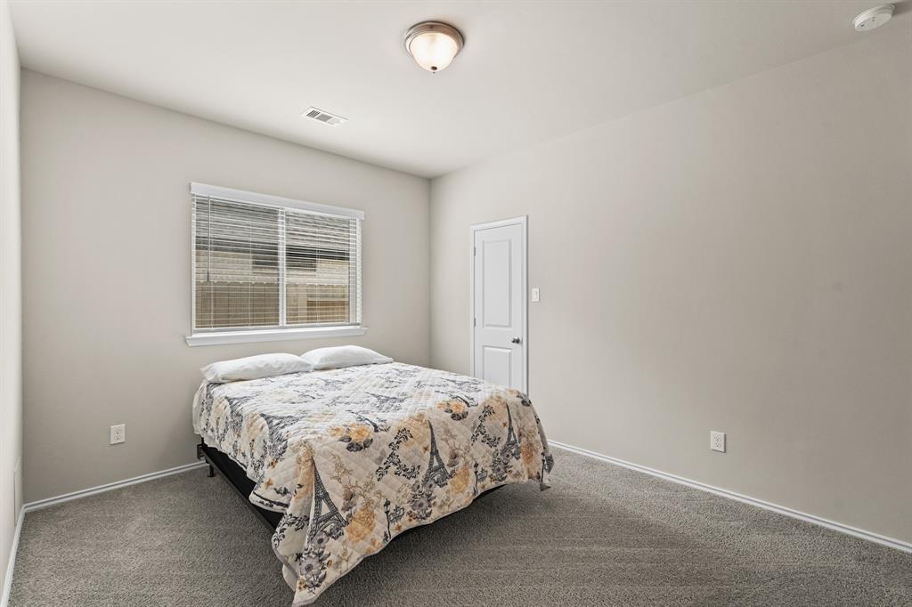 13x13 - Plenty of space for a queen sized bed and additional furniture!