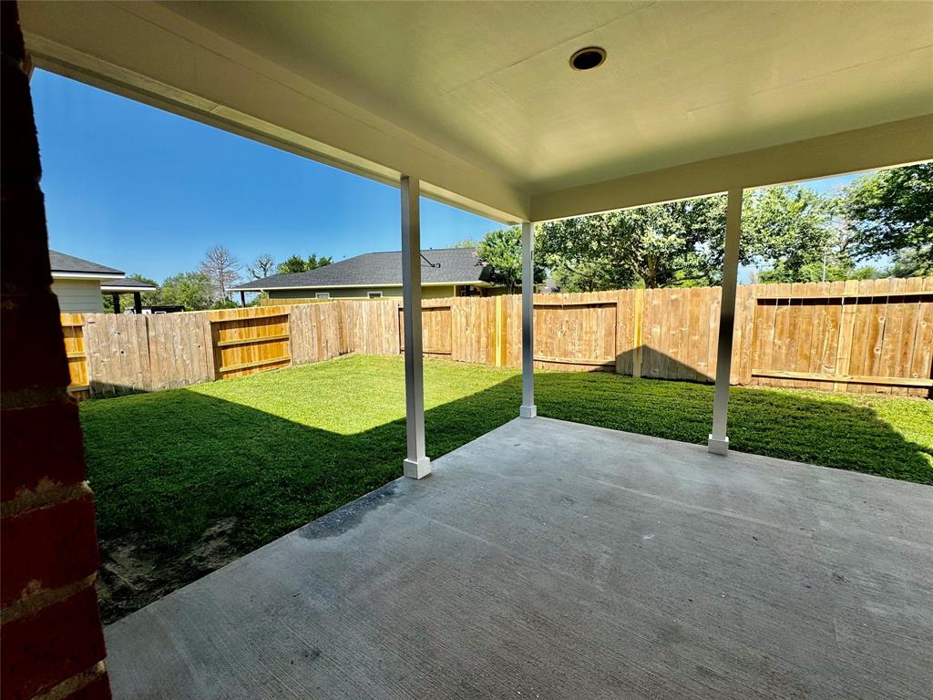 Covered back porch for entertaining.