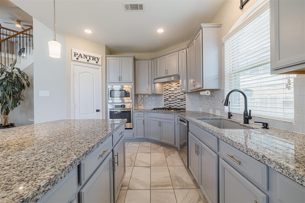 The kitchen also features an undermount sink.