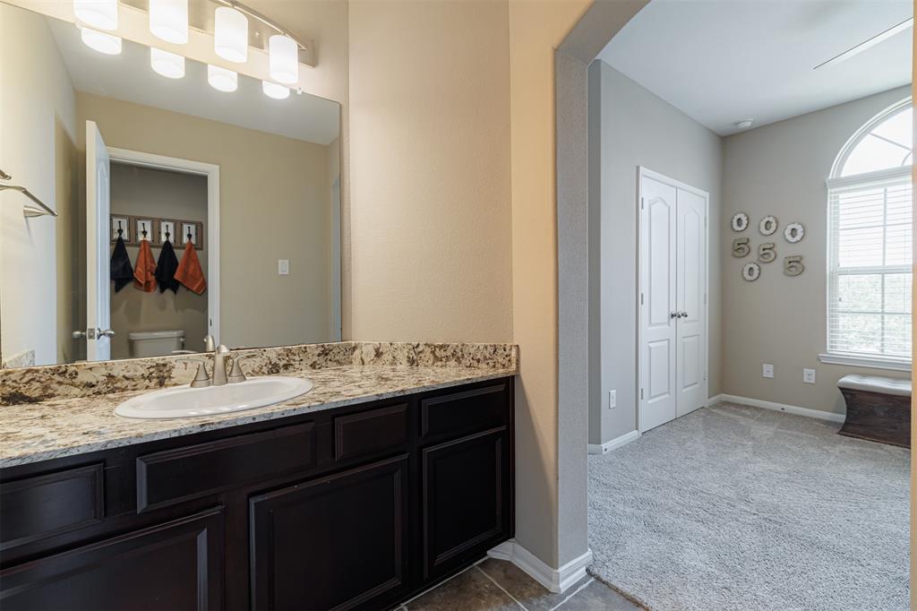 Private sink area and closet for bedroom #3.