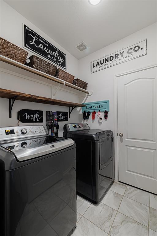 Laundry room located downstairs.