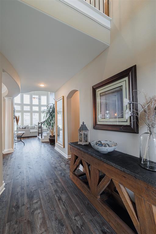 From the foyer you can see the open floor plan leading to the family room.