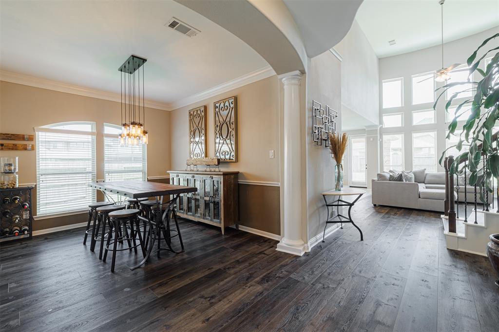 A view of the formal dining and family room from the foyer.