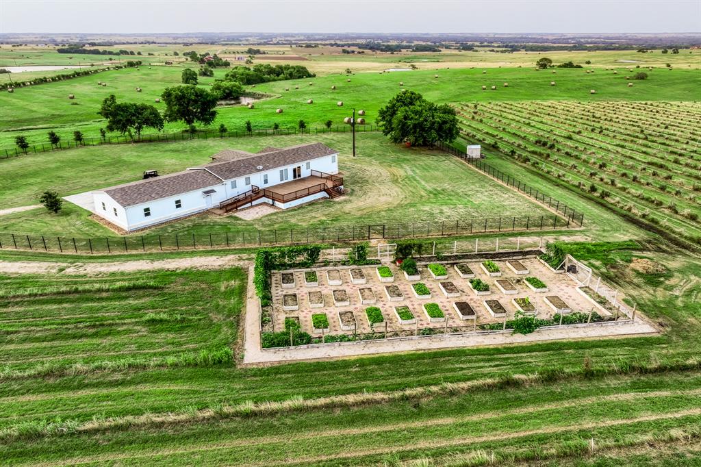 Nestled within the serene landscape of Jamila Olive Orchard, the raised beds stand as a testament to innovative and efficient gardening. Each bed is thoughtfully constructed from durable, rustic wood, blending seamlessly with the natural surroundings while providing a sturdy and lasting structure for your plants. The raised design not only enhances soil drainage but also makes tending to your garden a comfortable and enjoyable activity.