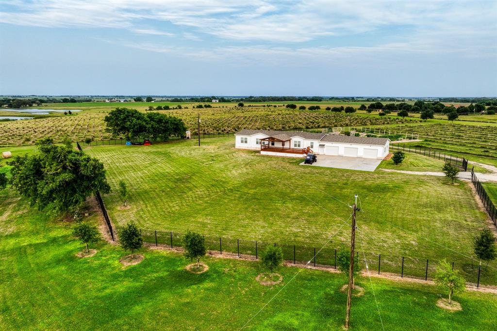 A surrounding fence provides security against wildlife, safeguarding your home.