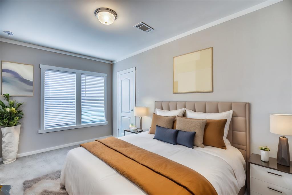 Experience comfort in each beautiful bedroom featuring plush carpet and a closet. Large windows invite natural light, creating a bright and airy atmosphere for a perfect retreat.