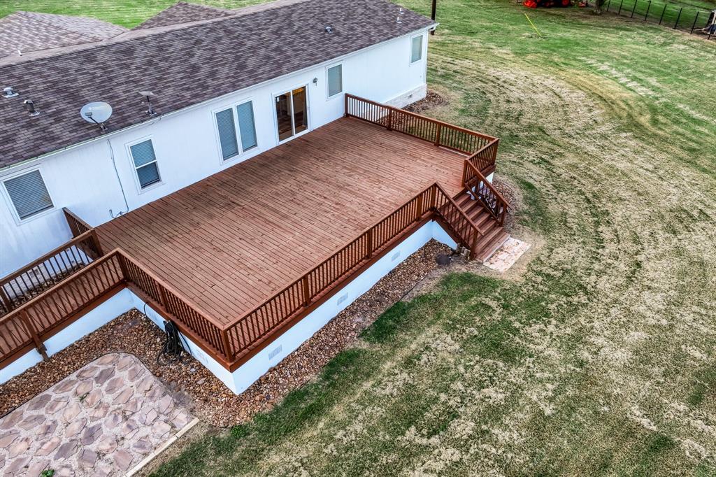 The spacious area can accommodate outdoor furniture, a dining set, and more, making it an ideal setting for hosting gatherings or simply soaking in the tranquility of the countryside.