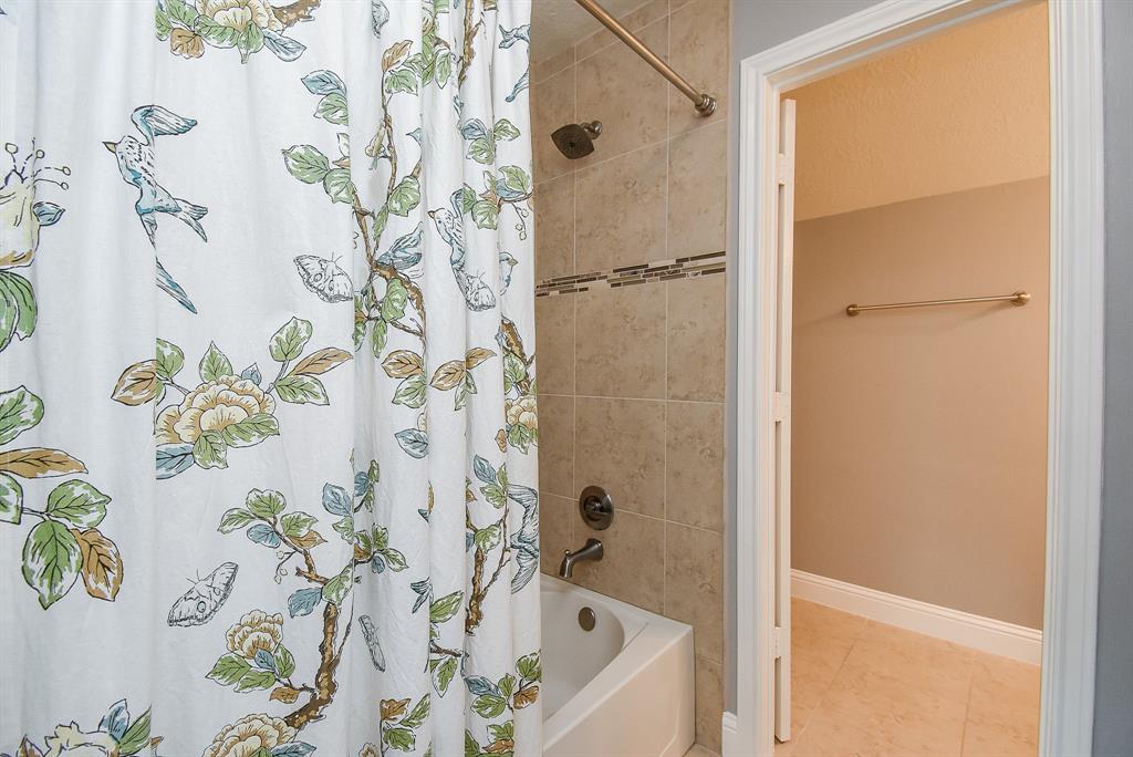 A second bath offers the convenience of a combined bathtub/shower.