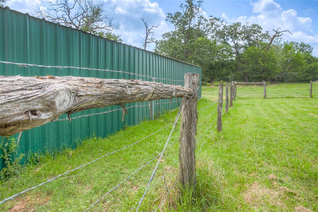 Cedar posts with barbed wire