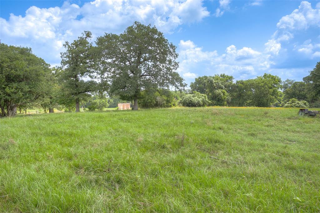 View to left behind the house and pool