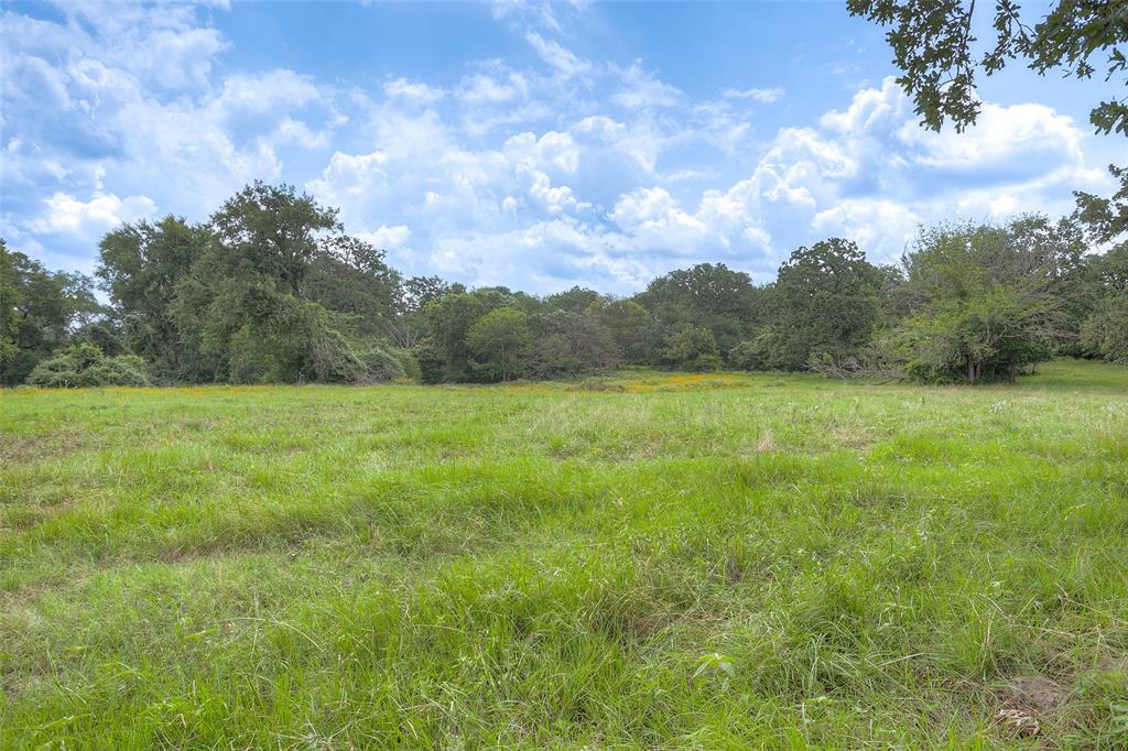 View to right behind the house and pool