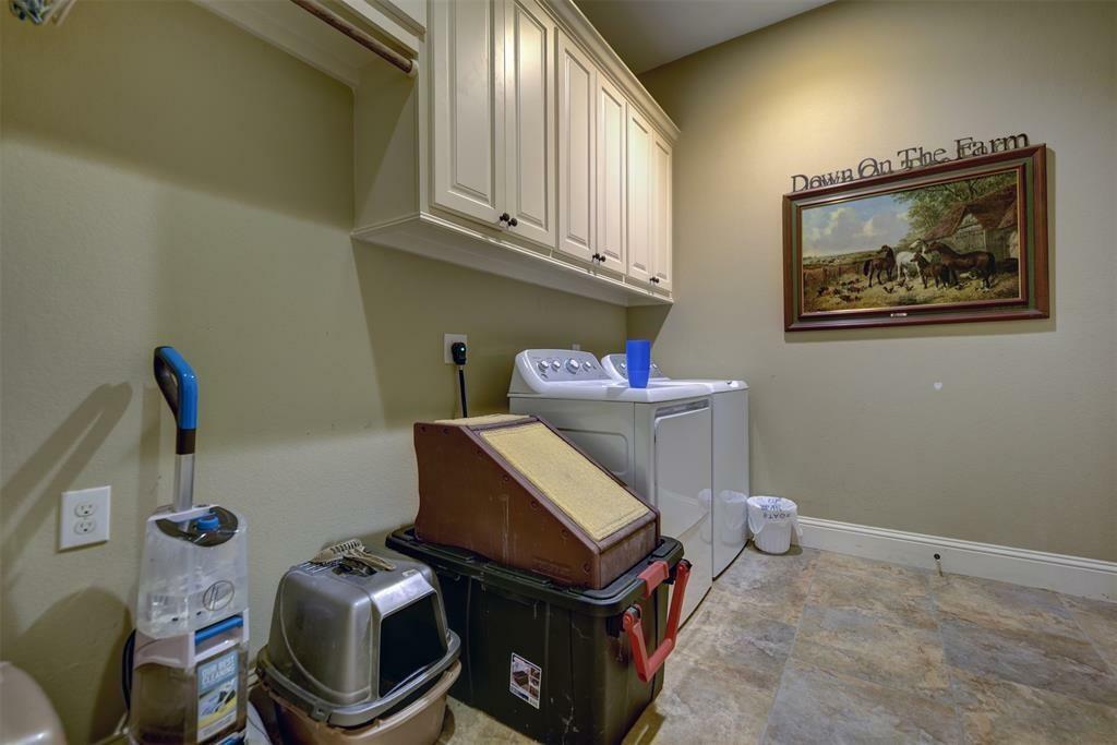 Large first floor laundry with direct access to the oversized garage.