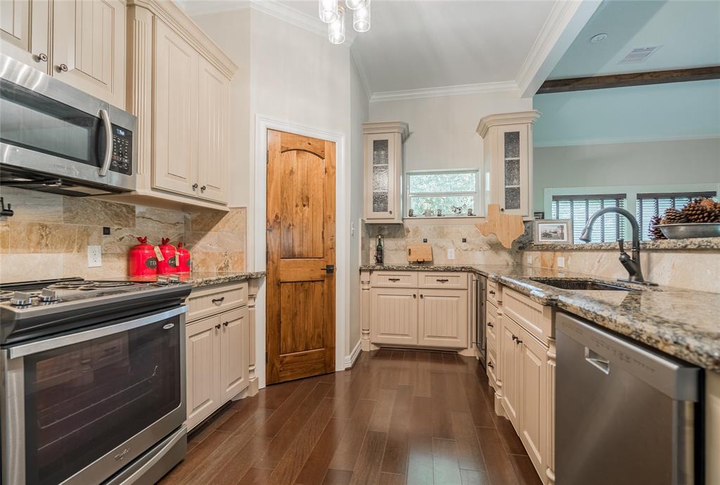 The counter at the end is set up as a bar and the built in wine cooler is to the right.