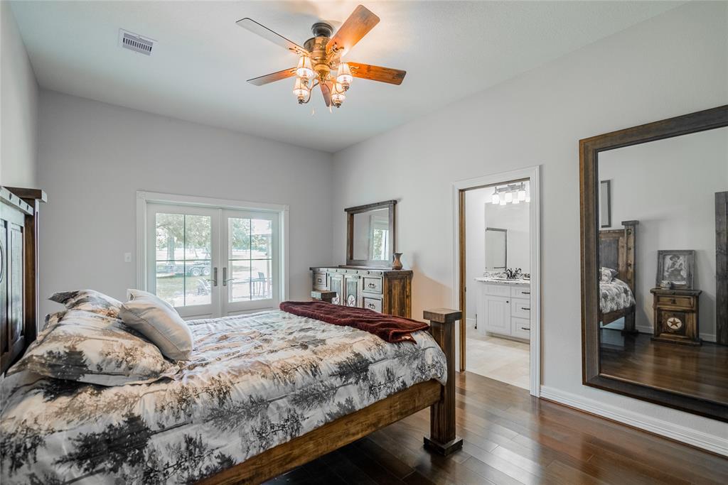 Here is the large master bedroom and bath. Notice the french doors that lead out to the porch.