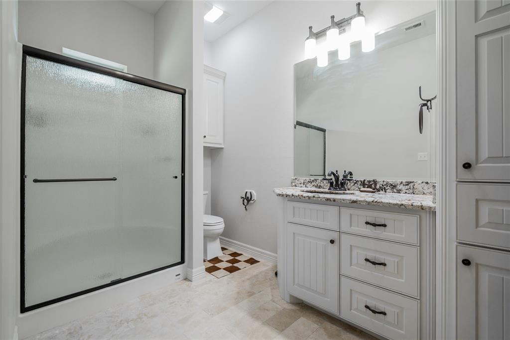 Large Bathroom with Granite Counter Tops.