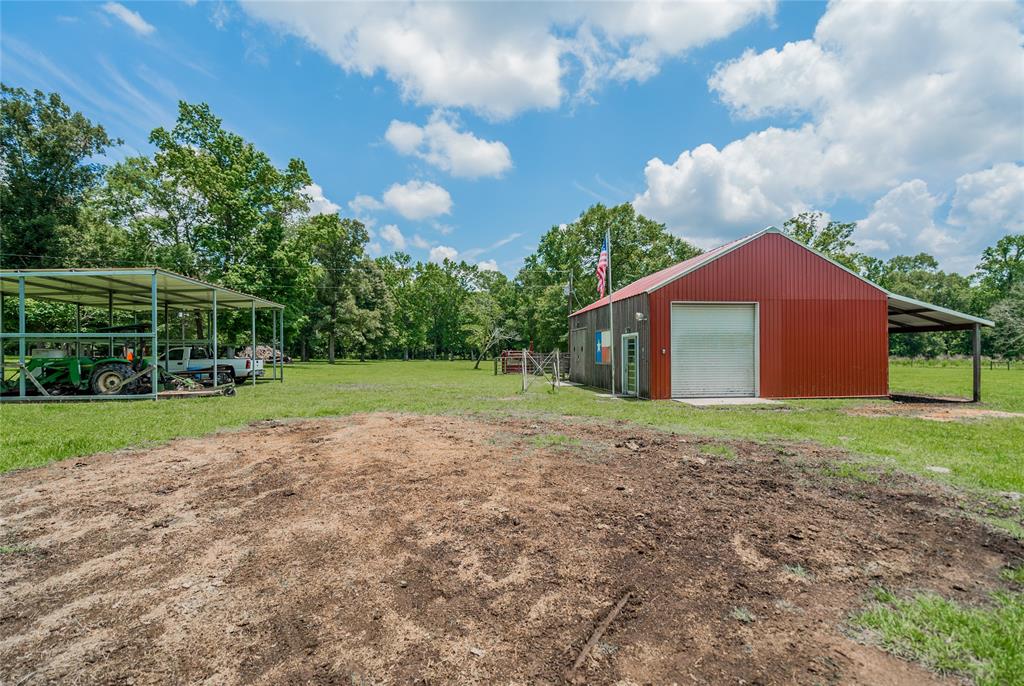 Enclosed Barn and Extra Parking for Farm Equipment.