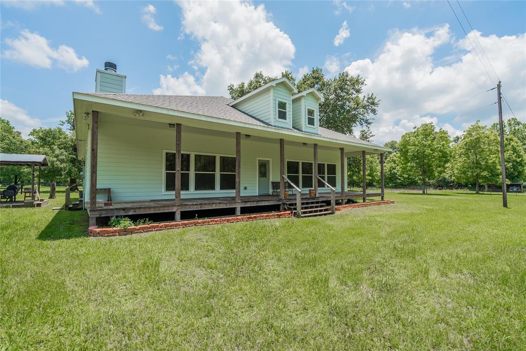 Some other information about the home is that it has 10\' ceilings, central air/heat, ceiling fans, and a security system in place. Ceiling beams in the Living Room and Dining Room are decorative, but are made of 6\