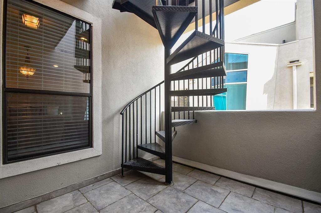 What\'s more romantic or intimate than this spiral staircase to your private rooftop oasis?