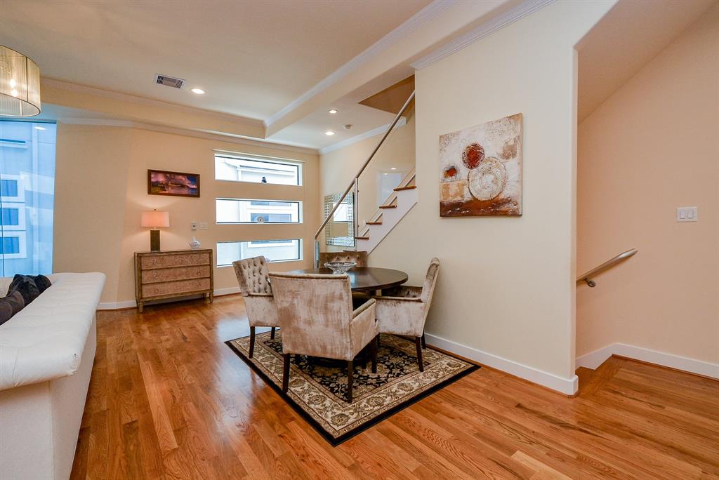 Formal? Casual? Late night snack? Breakfast? Be seated and be comfortable! This staircase wall is so conducive to furniture placement.