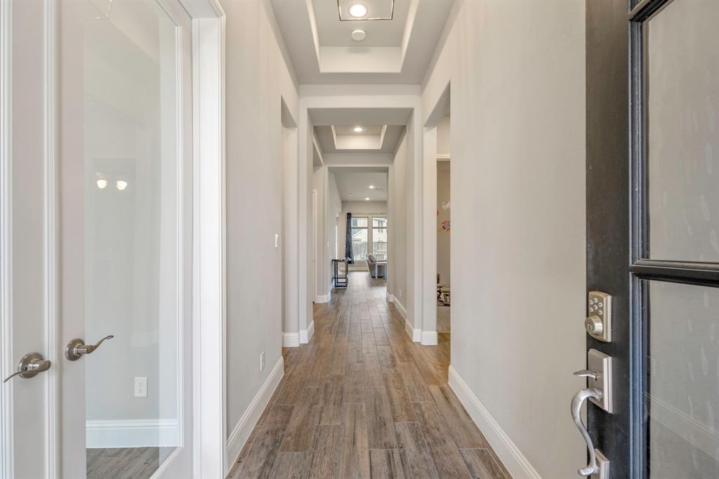 You will love the details of this kitchen including under cabinet lighting, a trashcan drawer, and a plethora of storage with hidden drawers in one set of cabinets, plus, pots and pans drawers underneath the gas cooktop!