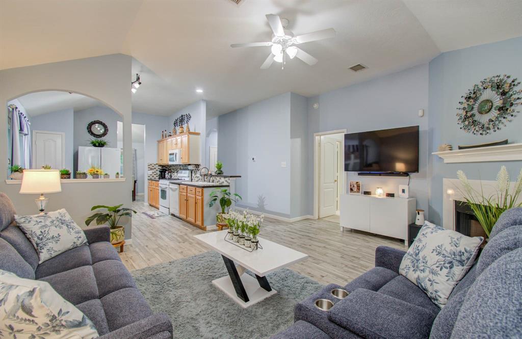 This inviting family room features a cozy gas fireplace