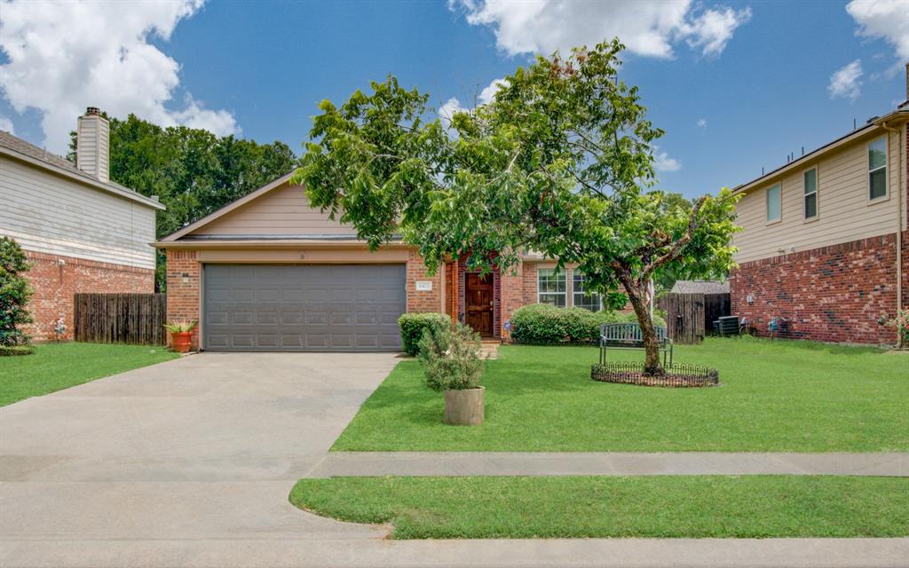 Stunning curb appeal and perfectly manicured front yard