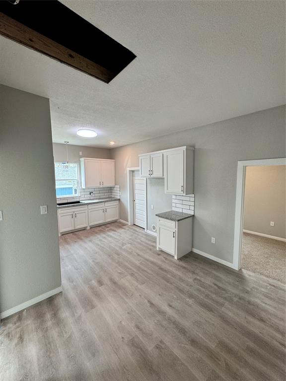 You can see the spot for the refrigerator, a little side cabinet for setting groceries